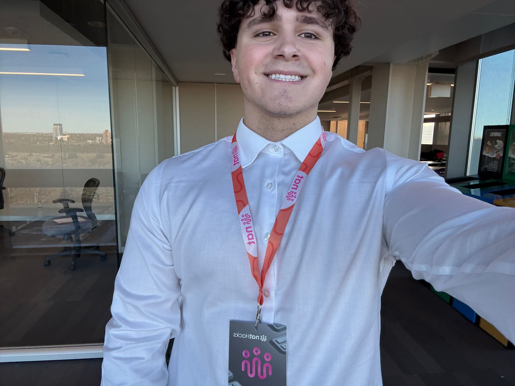 Badge on, top floor, ten minutes before demos.
